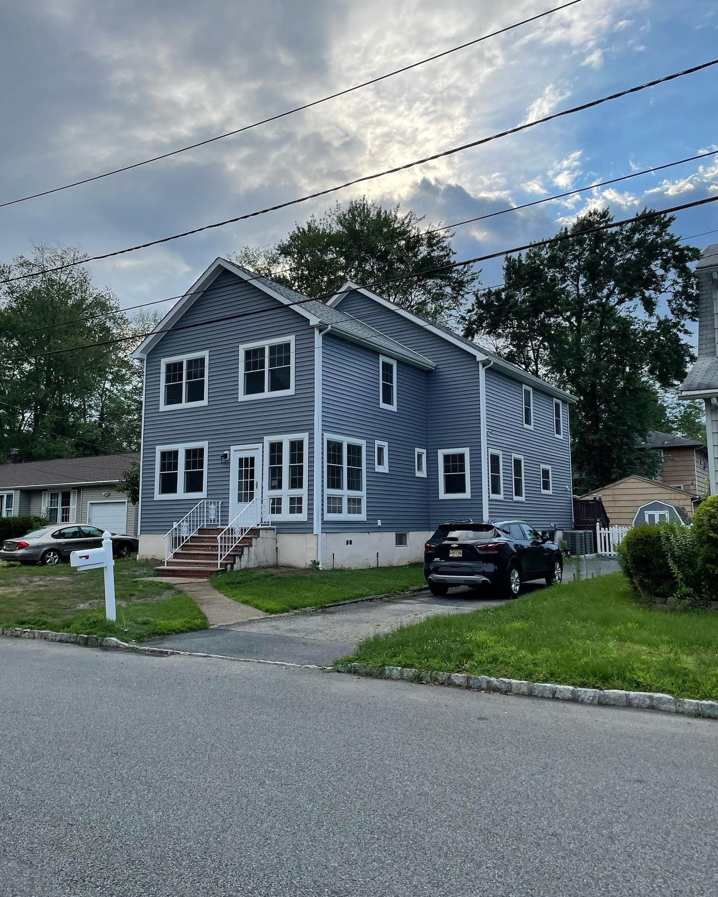 Complete siding replacement, two-story home