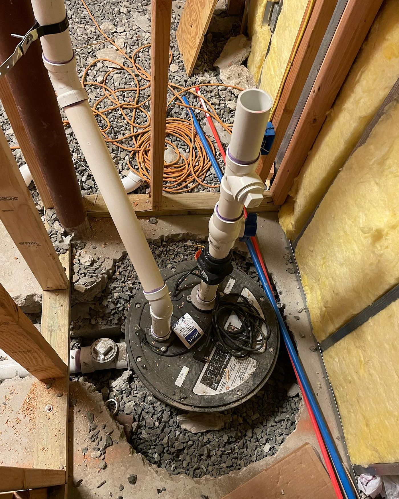 Sump pump installation with new drain lines