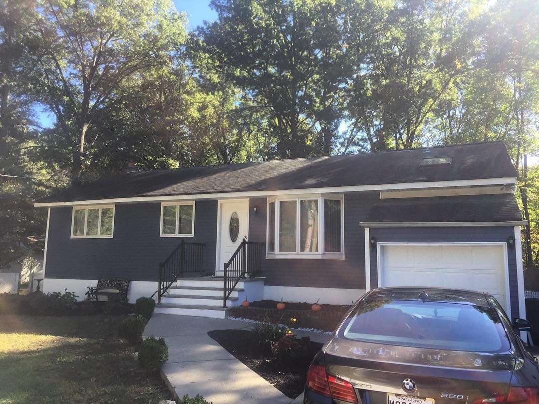 New siding, trim and front steps on a ranch