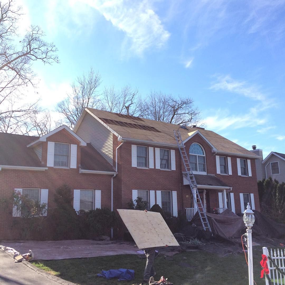 Full roof replacement, brick colonial
